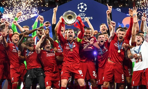Liverpool celebrating their Champions League trophy